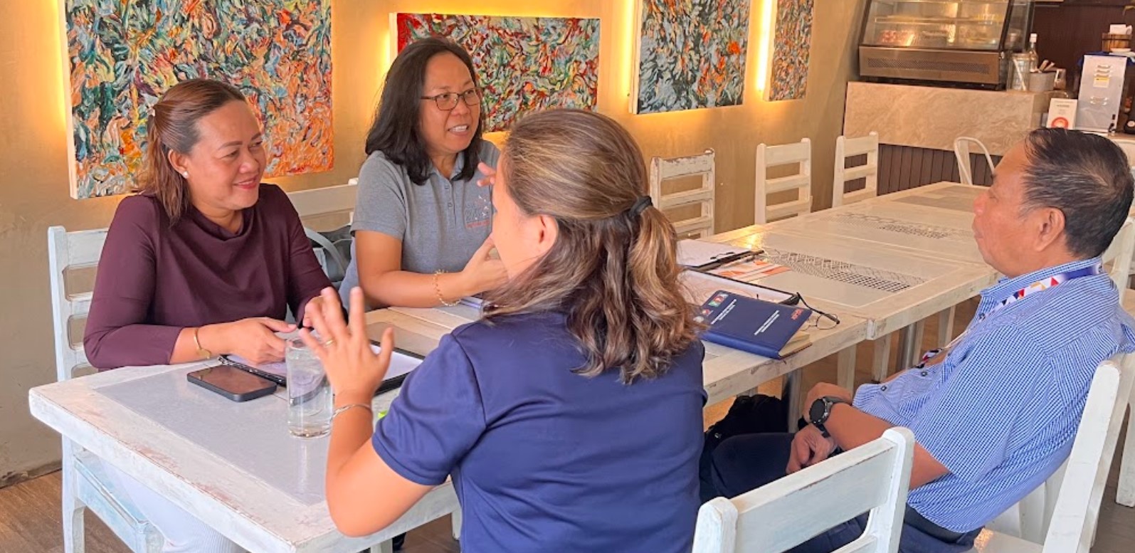 Mr. Arnold Faelnar, DTI Surigao del Norte Provincial Director, together with Ms. Ninebeth Balighot, DTI-TIDS, listened to Ms. Cris Binas, A-PAD PH Program Chief Coordinator, and Ms. Metchel Verona, SCCI Executive Director, as they shared how the Microenterprise Resilience Program was implemented in three barangays of Surigao City.
